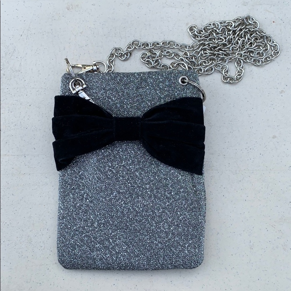 Brand new silver glitter and bow crossbody purse